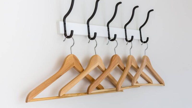 More Than Just a Hanger: The Versatility of Wooden Coat Hangers in Retail